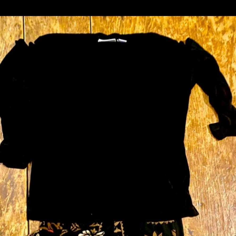 Chico’s Travelers knit black, long sleeve, V-neck shirt. Size 1.